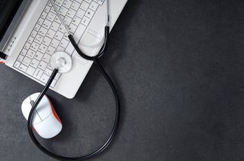 Laptop with stethoscope apply for an NPI number