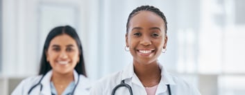 two women locum tenens physicians smiling