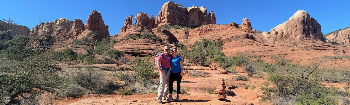 Locum Tenens CRNA Michael Temple standing in the desert with rock formations in the background
