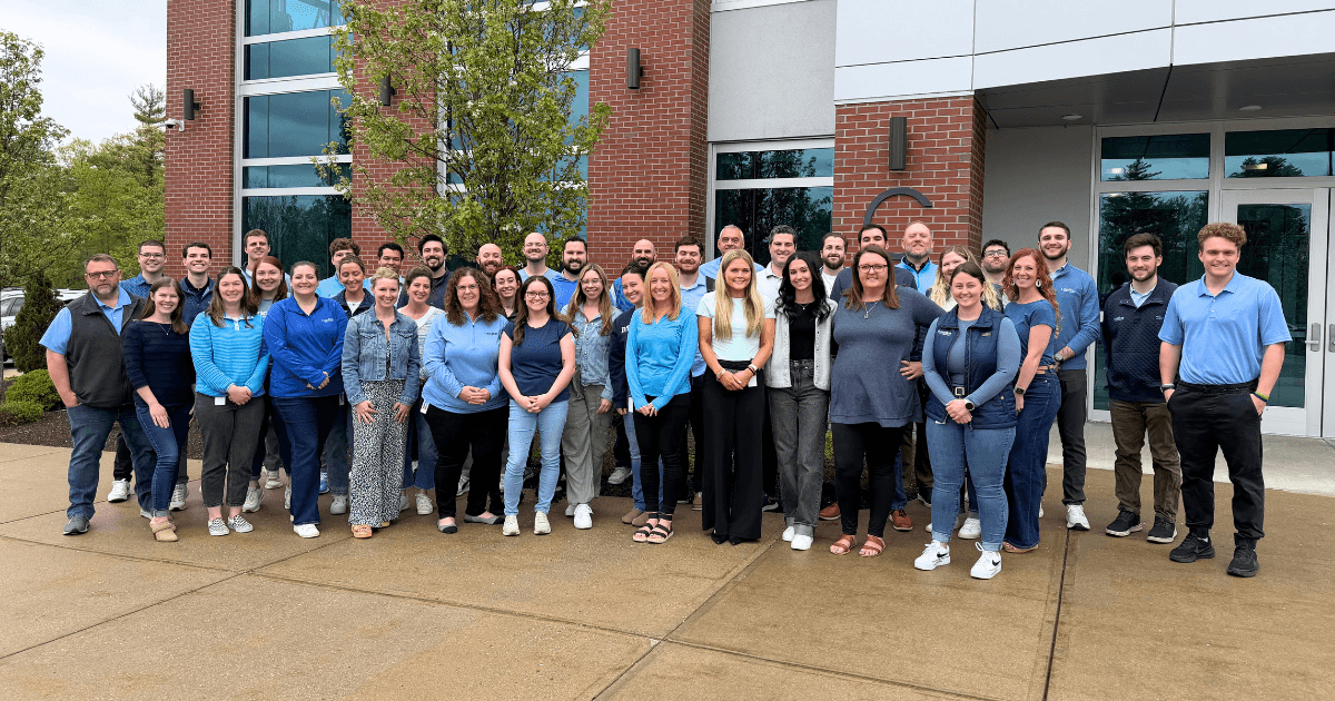 Medicus Healthcare Solutions locum tenens recruiting team standing outside company headquarters, helping physicians and advanced practitioners find career opportunities tailored to their goals.